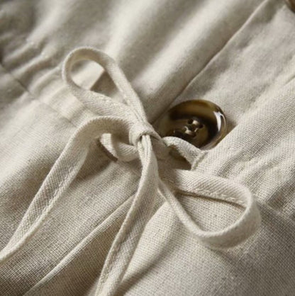 One-piece trousers with pocket buttons